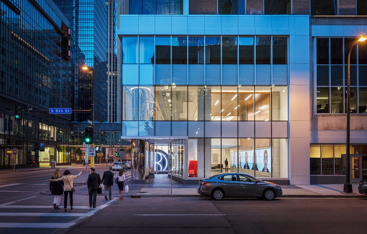 Downtown storefront glazing at dusk